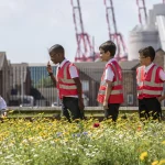 Mayor Steve Rotheram with children at an environmental project.